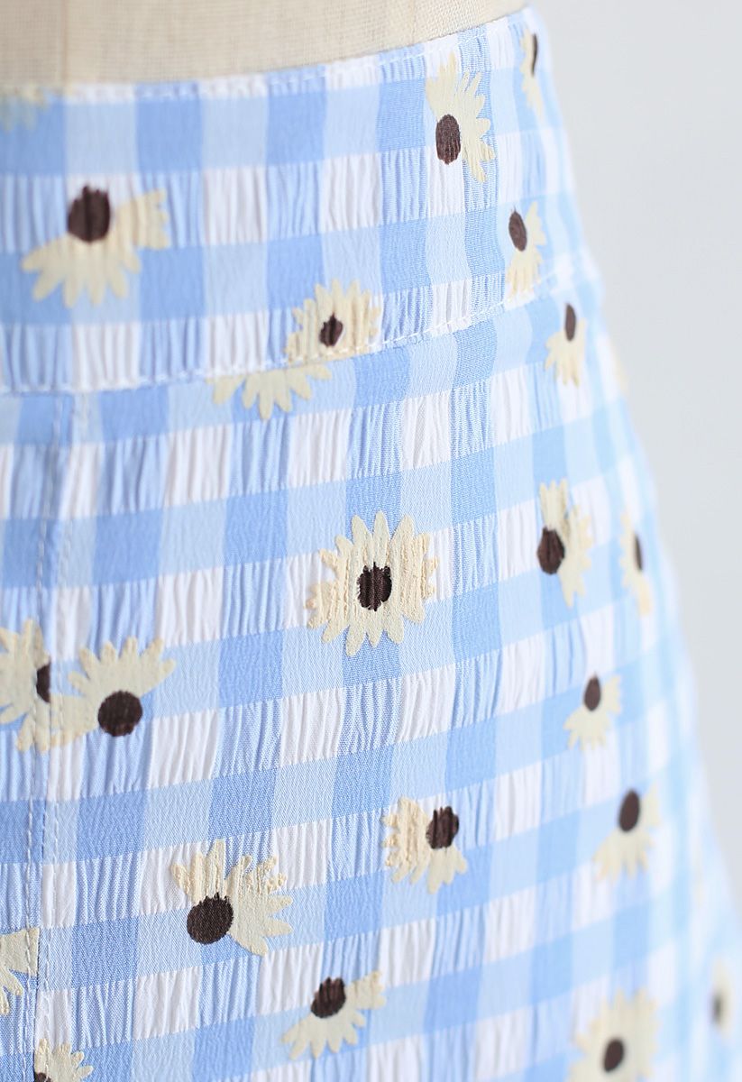 Falda de brotes de cuadros vichy con estampado de margaritas de verano en azul