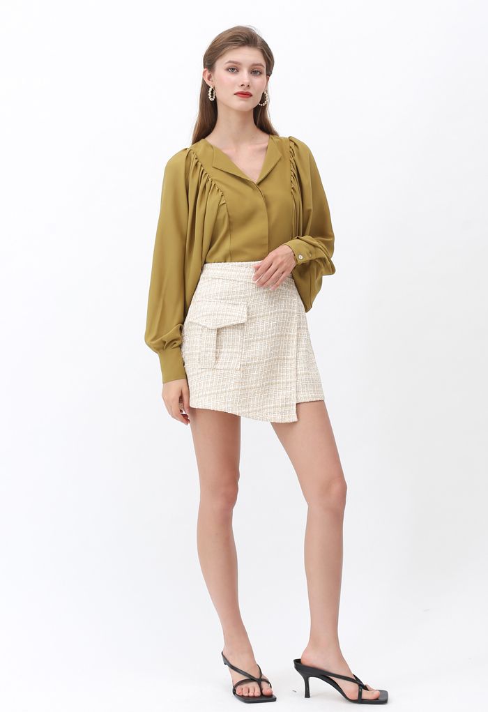 Minifalda asimétrica de tweed en amarillo claro